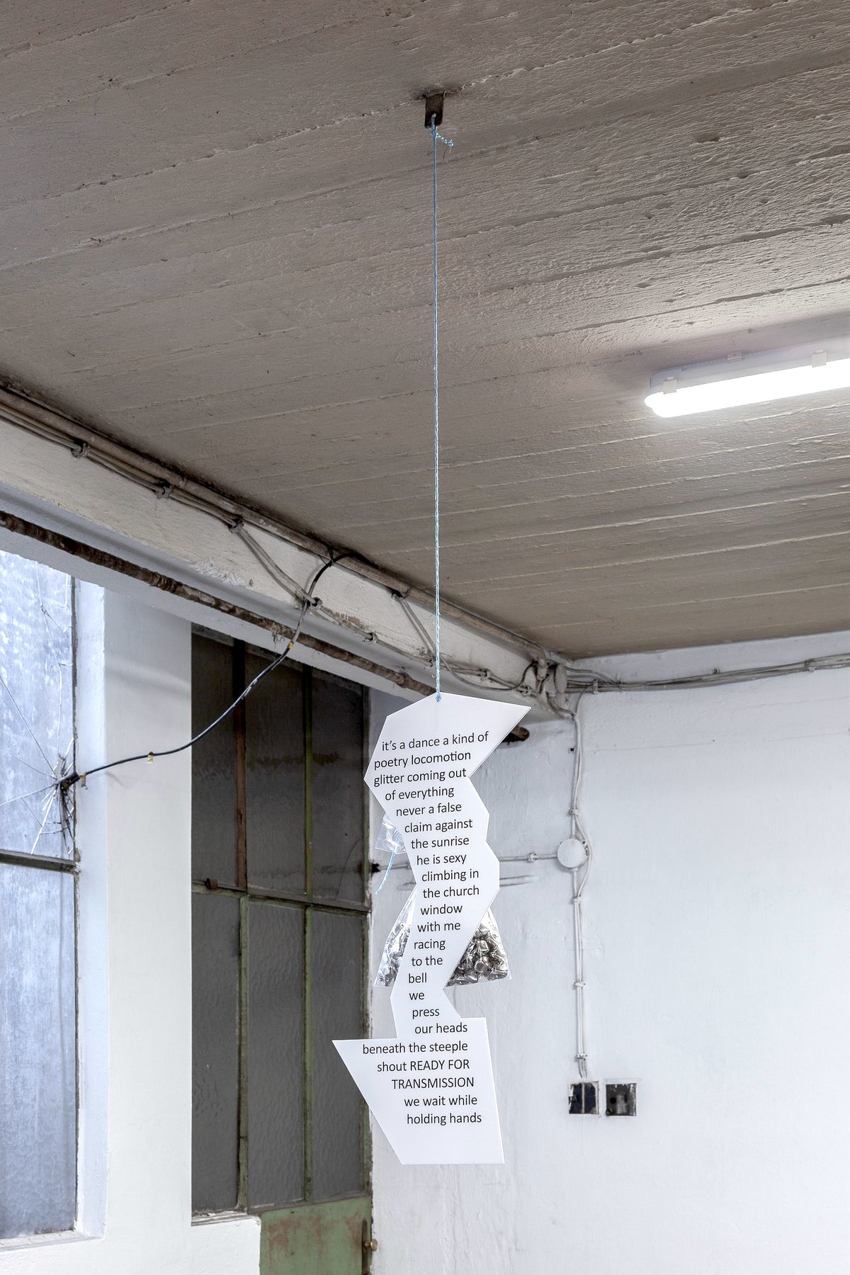 Installation shot of a limited edition by Jason Dodge and CAConrad at Astoria Art Show Vienna Poetry Poem 