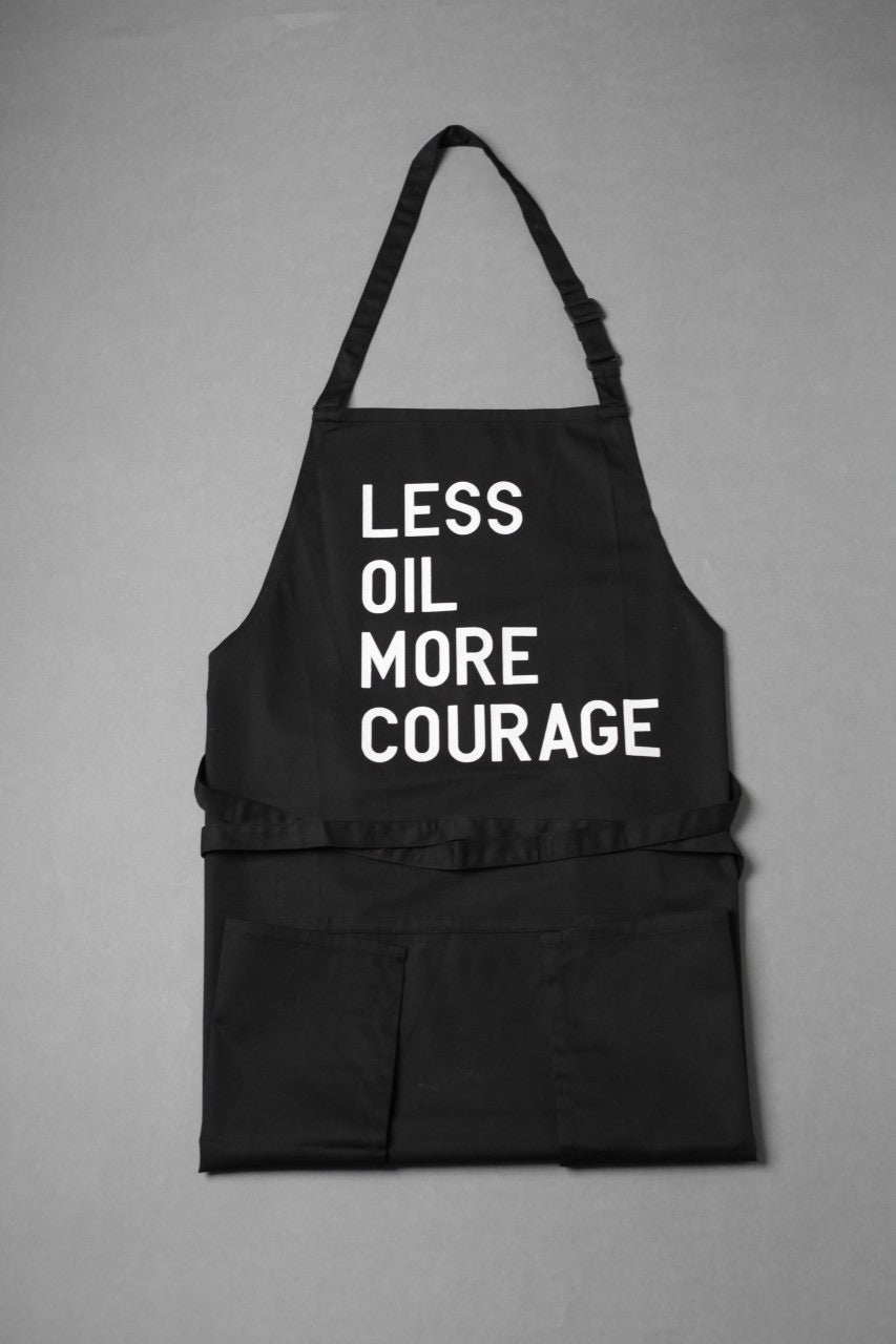Rirkrit Tiravanija;
Untitled (less oil more courage)&nbsp;
2015;
Silkscreen Print on Cotton Apron
Ed 100, not numbered, not signed